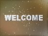 Brown Welcome Loop with Particles
